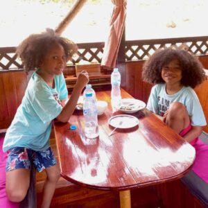 Kids having lunch on the boat, Mekong Slow Boat Cruise