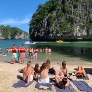 Kayaking from an island during the Halong Hideaway trip